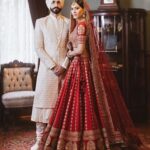Bride in a red lehenga for a Sikh wedding